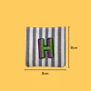 Green-purple letter 'H' Iron-on Embroidery