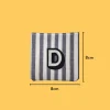 White letter 'D' Iron-on Embroidery