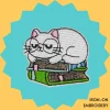 Sleeping White Cat on Book Iron-on Embroidery