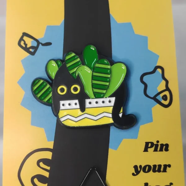 Black Cat in Striped Leaves Plant Enamel Pin
